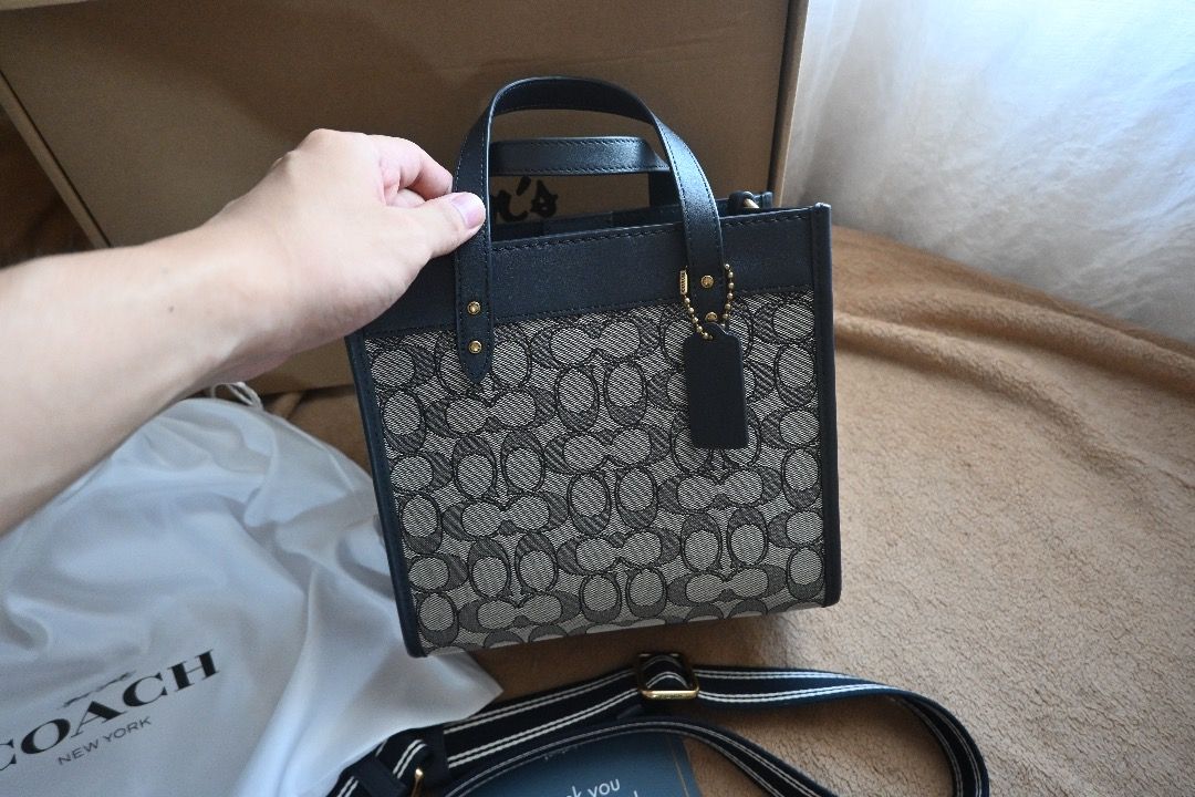 Coach Field Tote 22 Navy Midnight Bag (Category: Luxury Bags & Wallets) located in Manila. Submitted by closetcorner. (Listing ID 1405913207, Image 2). Description: Selling my preloved used only once coach bag. Reason for selling: Declutterring. I used it once on my trip to Thailand. Brief Bag Description: Style number CD680. 100% Authentic. Bought it from Rustans for 35,500php. I still have the tag and receipt for it. From busy weekdays to fun-f