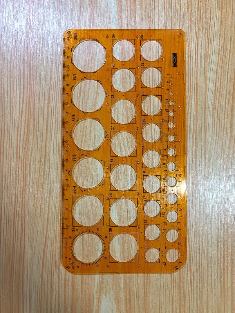 COX Circle Template Ruler (Category: Craft Supplies & Tools) located in Valenzuela. Submitted by caulfieldscollection (Listing ID 1405990880, Image 3). Description: COX circle template ruler Transparent orange plastic Includes multiple circle shapes Features edge measurements Perfect for drawing and design work For architects,designers,artists Still in good condition Has a bit scratches only RFS: Decluttering unused items DM me if interested..