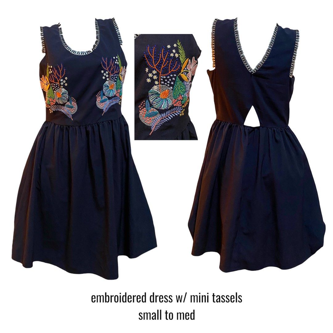 Embroidered Dress with Mini Tassels (Category: Dresses) located in Calapan. Submitted by roxyheartlover (Listing ID 1405960150, Image 1). Description: - Navy blue dress - Colorful embroidered details - Scoop neckline - V-back with triangular cutout - Flared skirt - Mini tassels along neckline - Fits sizes: Small to Medium - Minimal flaw: no zipper handle.