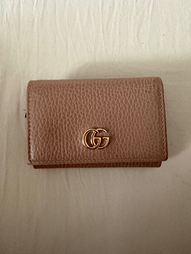 Gucci GG Marmont Compact wallet (Category: Luxury Bags & Wallets) located in Quezon City. Submitted by hvamom (Listing ID 1401736554, Image 2). Description: Trifold with coin purse zipper beige pink color complete tag box dustbag pm for photos if interested Rfs: need cash for my son therapy .