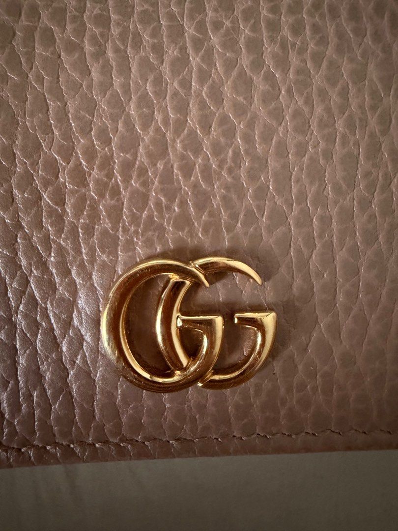 Gucci GG Marmont Compact wallet (Category: Luxury Bags & Wallets) located in Quezon City. Submitted by hvamom (Listing ID 1401736554, Image 3). Description: Trifold with coin purse zipper beige pink color complete tag box dustbag pm for photos if interested Rfs: need cash for my son therapy .