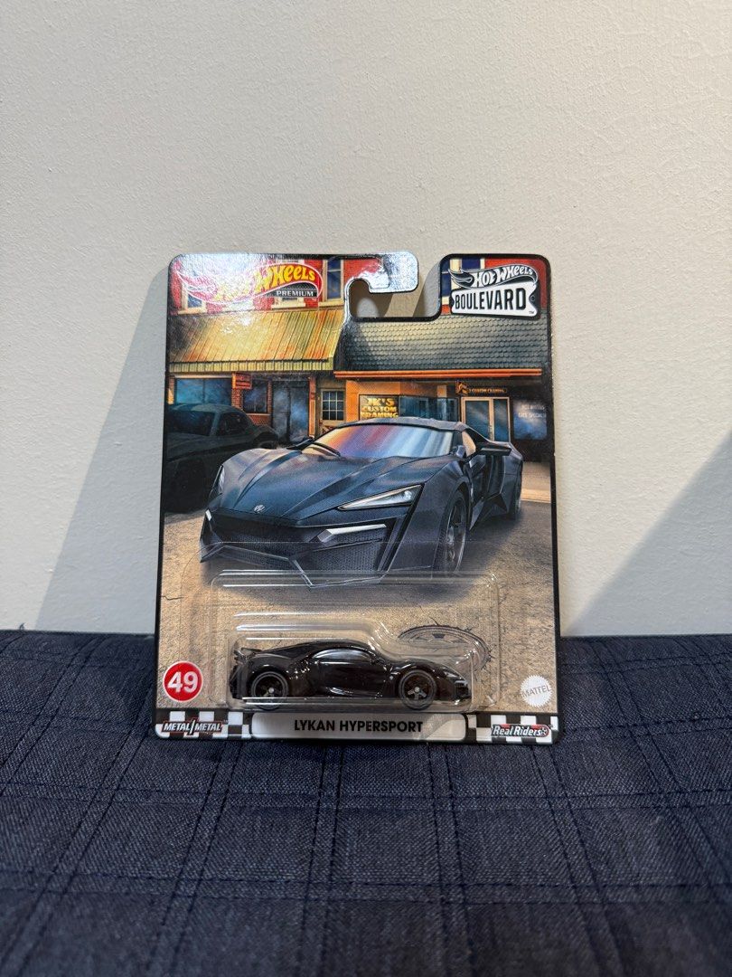 Hot Wheels Boulevard Lykan Hypersport (Category: Vehicle & Diecast Models) located in Quezon City. Submitted by cat13v (Listing ID 1406011736, Image 1). Description: - Hot Wheels Boulevard Series - Lykan Hypersport model - Sleek black color - Comes in original packaging - Perfect for car collectors.