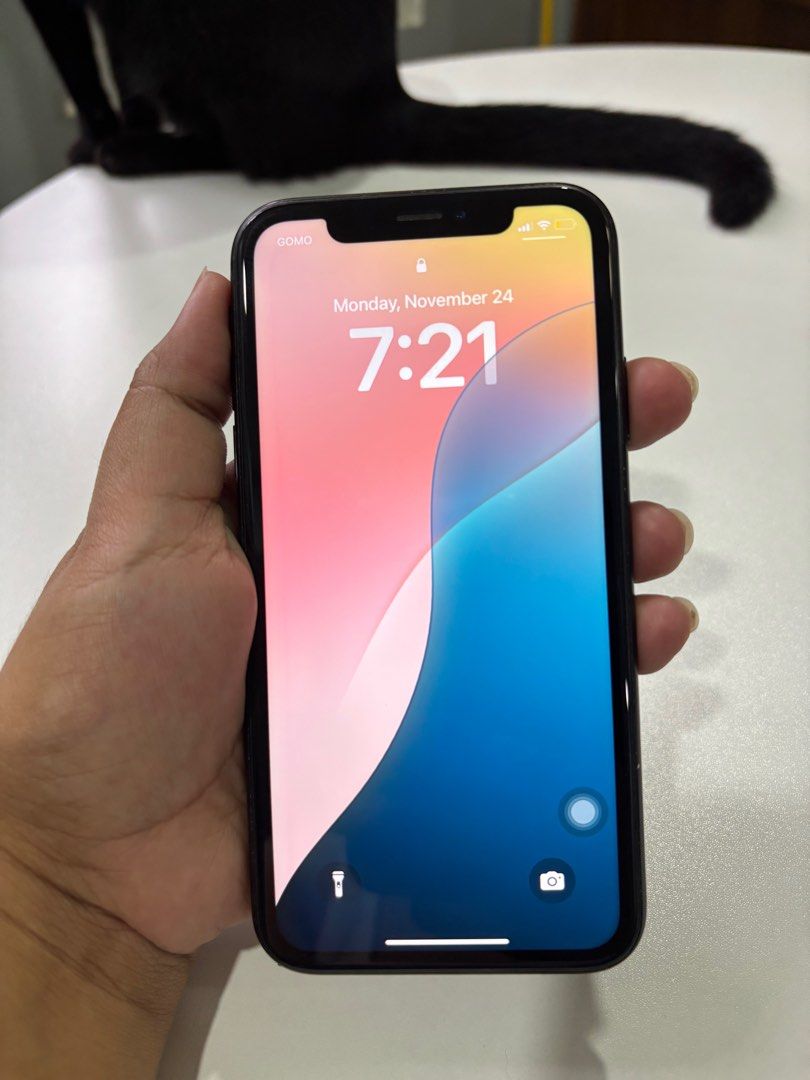 Iphone XR 64GB (Category: iPhone X Series) located in Marikina City. Submitted by decluttering__E (Listing ID 1405911288, Image 3). Description: - iPhone XR 64GB - Black color - Includes cases - No issue - 73 battery life.