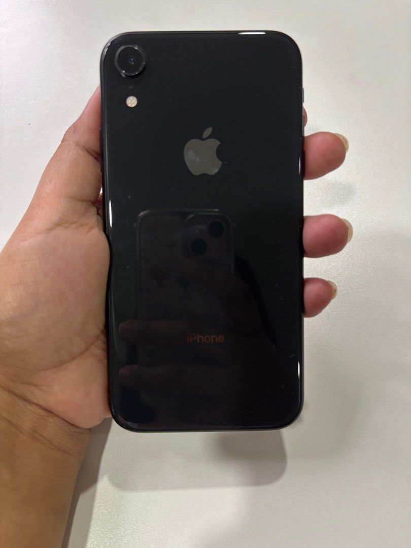 Iphone XR 64GB (Category: iPhone X Series) located in Marikina City. Submitted by decluttering__E (Listing ID 1405911288, Image 2). Description: - iPhone XR 64GB - Black color - Includes cases - No issue - 73 battery life.