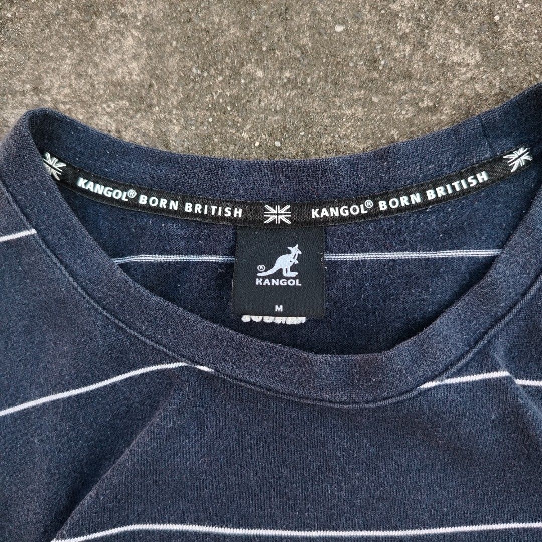 Kangol Striped T-shirt - Medium (Category: Tshirts & Polo Shirts ) located in Manila. Submitted by hollyboyz (Listing ID 1405929513, Image 2). Description: - Kangol striped t-shirt - Color: Navy blue and white - Size: Medium - Features Kangol logo on chest - Brand name on collar - Number "38" printed on the back - Short sleeves - Crew neck.