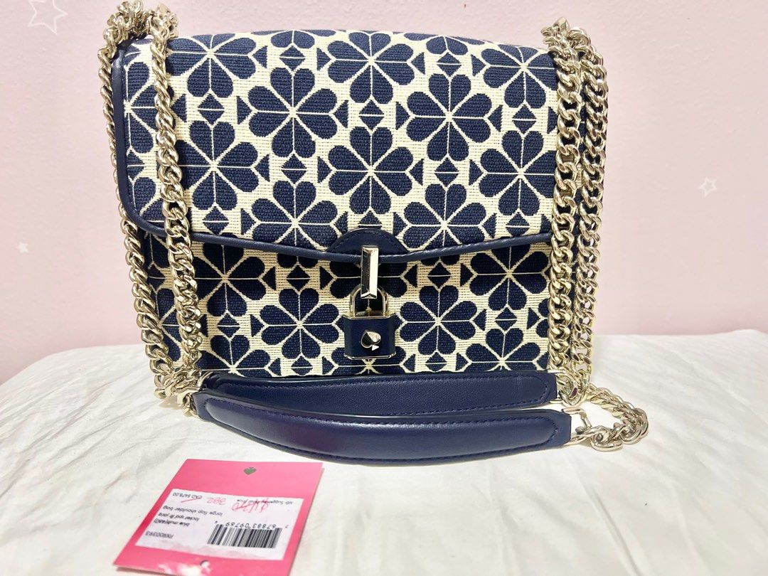 Katespade Flower jacquard small flap (Category: Luxury Bags & Wallets) located in Quezon City. Submitted by obsessedwithbagsbymsjpq (Listing ID 1405940977, Image 2). Description: Has a fine scatches on the turnlock barely noticeable. .
