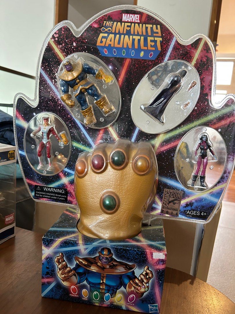 Marvel The Infinity Gauntlet Action Figure Set (Category: Figurines & Statues) located in Manila. Submitted by int38 (Listing ID 1405934997, Image 2). Description: - Marvel Infinity Gauntlet action figure set. - Includes Infinity Gauntlet and action figures. - Features Thanos, Death, and other characters. - Suitable for ages 4+. - Possibly a San Diego Comic-Con 2014 edition. 5000 non negotiable as is where is.