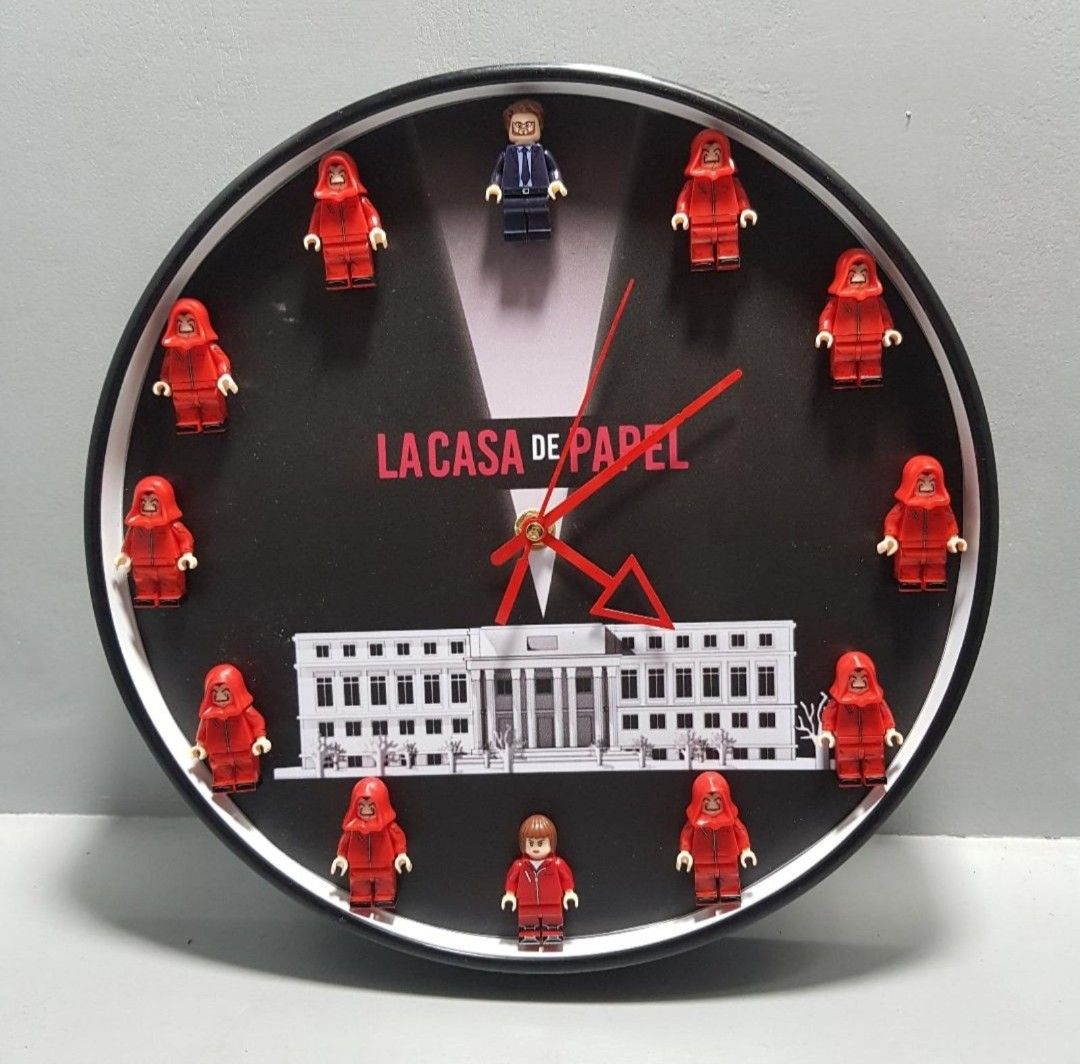 Money Heist (La Casa De Papel) Customized Minifigure Clock (Category: Clocks) located in Manila. Submitted by skadooshcorner (Listing ID 1405939039, Image 2). Description: Money Heist Clock Approximately 11.5 inches diameter Customized with Minifigures Includes the following Minifigures: 1 x The Professor 1x Tokyo 10 x Money Heist Minifigures Collectible.