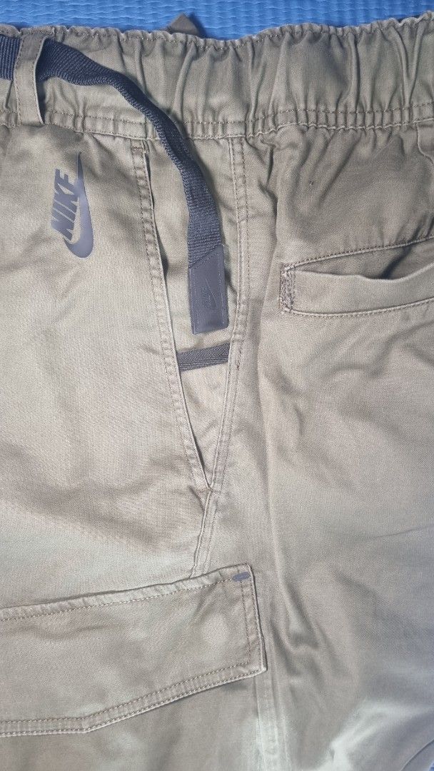 Nike ACG Green Cargo Pants XS (Category: Other Bottoms) located in Manila. Submitted by blizzardstan (Listing ID 1405946815, Image 3). Description: - Green Nike cargo pants - Size: XS - Relaxed fit - with belt - Multiple pockets - Nike logo on back pocket.