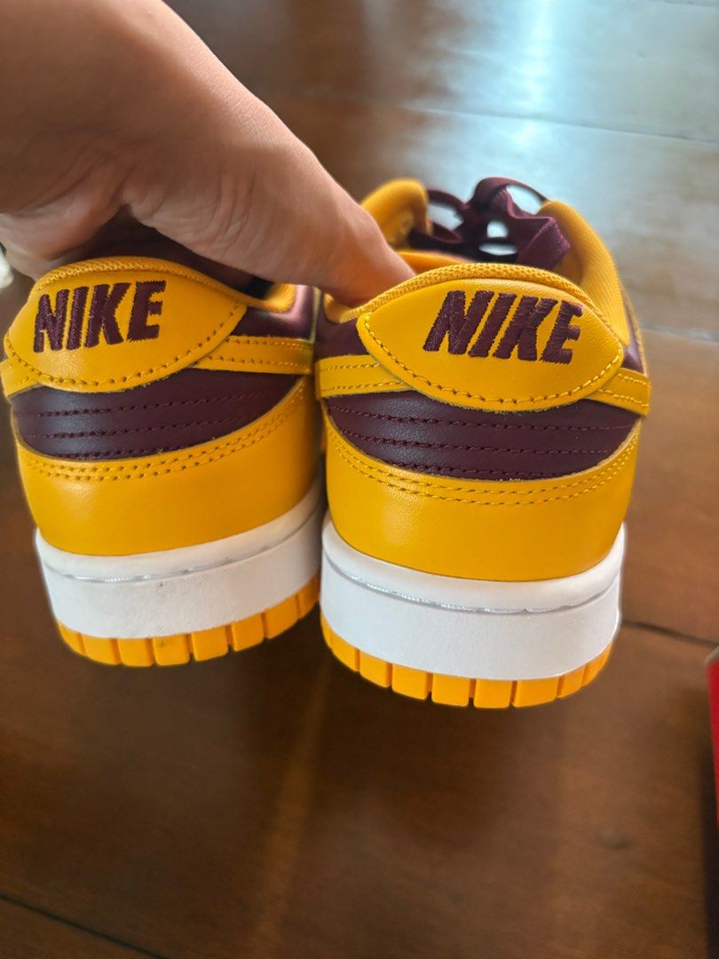 Nike Dunk Low Retro - University Gold (Category: Sneakers) located in Manila. Submitted by caarii (Listing ID 1405920631, Image 2). Description: Nike Dunk Low Retro 'University Gold'. Gold and burgundy colorway. Includes original box..