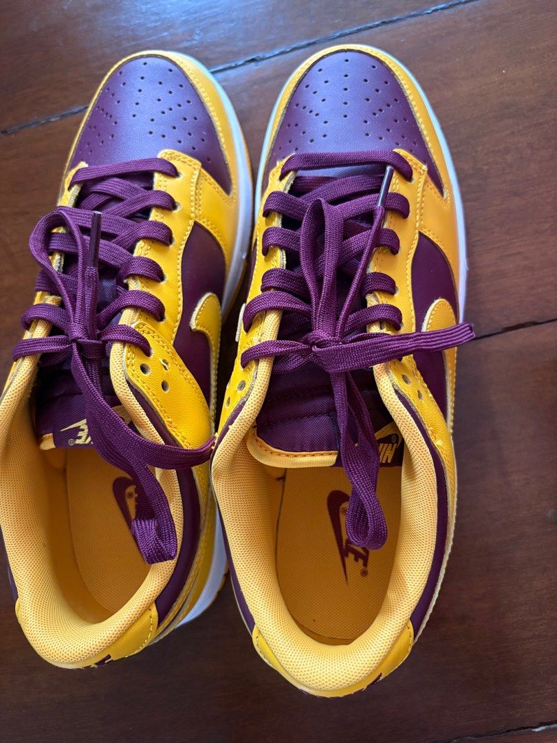 Nike Dunk Low Retro - University Gold (Category: Sneakers) located in Manila. Submitted by caarii (Listing ID 1405920631, Image 1). Description: Nike Dunk Low Retro 'University Gold'. Gold and burgundy colorway. Includes original box..