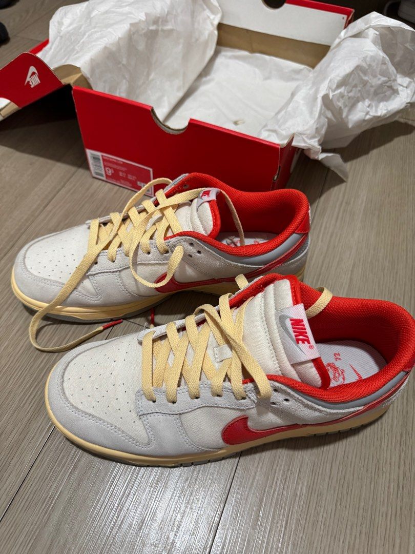 Nike Dunk Low Sail/Picante Red-Photon Dust (Category: Sneakers) located in Manila. Submitted by rexign_ (Listing ID 1405952054, Image 1). Description: - Nike Dunk Low - Colorway: Sail/Red/Grey - Red swoosh and accents - Size: US 9.5 / EUR 43 - Includes original box - Made in Vietnam - from Php 5,895 original proce.