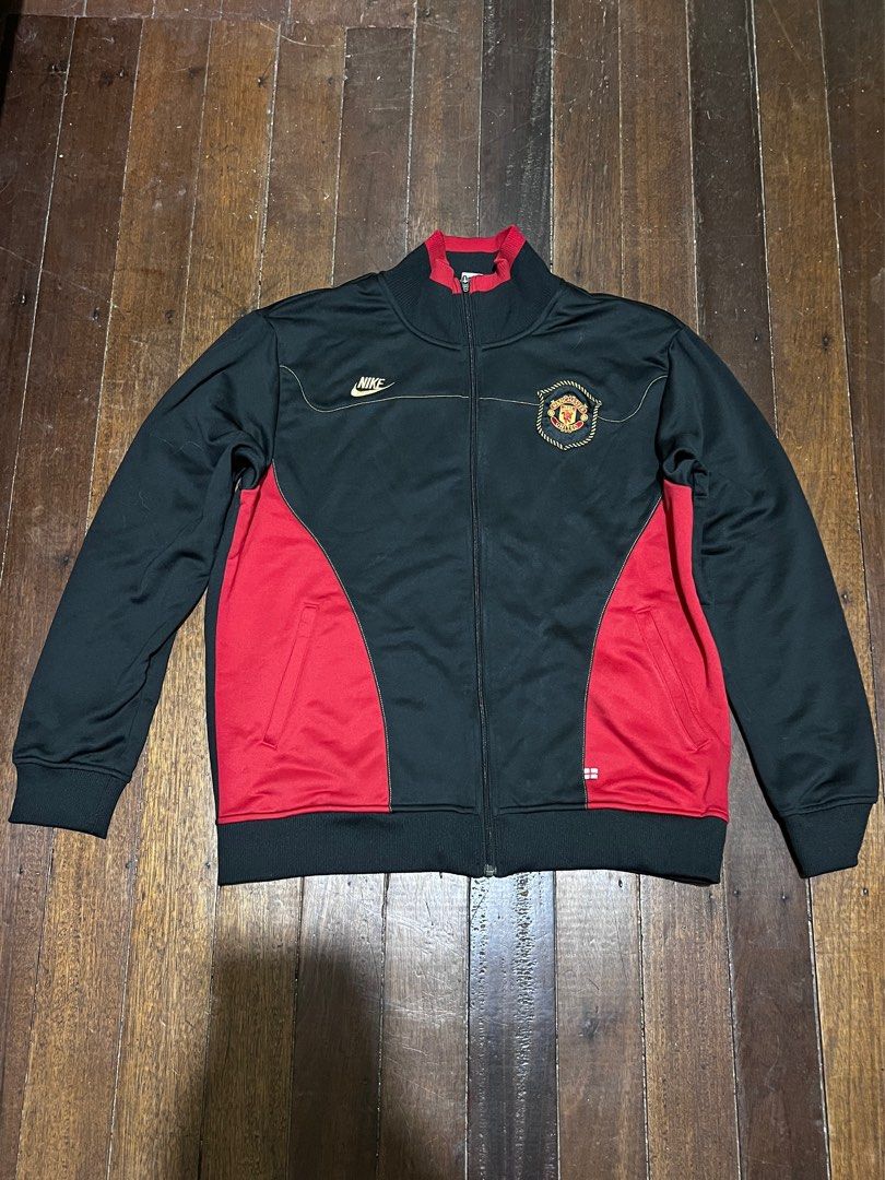 Nike manchester united track jacket (Red Devils) (Category: Hoodies) located in La Trinidad. Submitted by triptothethrifttt (Listing ID 1405975316, Image 2). Description: Track jacket mala central cee Good as new Dimes: 24 x 27 large to xl Need wash No issue.