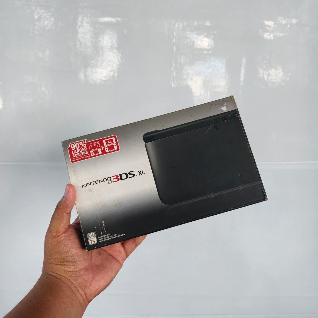Nintendo 3DS XL Black Complete Box (Category: Nintendo) located in Plaridel. Submitted by tocilevelup011317 (Listing ID 1405950608, Image 1). Description: FOR SALE: NINTENDO 3DS XL BLACK COMPLETE BOX ✅ COP & MEET UP ✅ CAN DO VIDEO CALL FOR TESTING ✅ 9/10 CONDITION ✅ BOTH SCREENS ARE GOOD ✅ 7 DAYS WARRANTY FOR PEACE OF MIND ✅ HSHOP INSTALLED (CAN DL ANY 3DS GAMES VIA WIFI) ✅ CAN REQUEST 3DS OR DS GAMES INCLUSIONS : BOX UNIT STYLUS MANUAL AR CARDS 