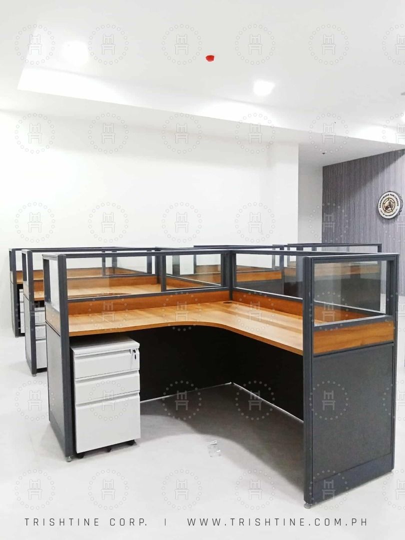Office Cubicle L-Type with Glass Partition (Category: Office Furniture & Fixtures) located in Quezon City. Submitted by evon_trishtinecorp. (Listing ID 1405931701, Image 1). Description: - Modern office cubicles - Dark gray frame - Wooden tabletop - Glass partition - Available in L-shaped and rectangular configurations - Optional rolling drawer cabinet - Durable and functional - Ideal for individual workspaces Call or Message me - Zero Nine Five 