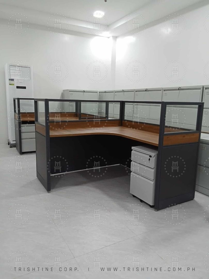Office Cubicle L-Type with Glass Partition (Category: Office Furniture & Fixtures) located in Quezon City. Submitted by evon_trishtinecorp. (Listing ID 1405931701, Image 2). Description: - Modern office cubicles - Dark gray frame - Wooden tabletop - Glass partition - Available in L-shaped and rectangular configurations - Optional rolling drawer cabinet - Durable and functional - Ideal for individual workspaces Call or Message me - Zero Nine Five 