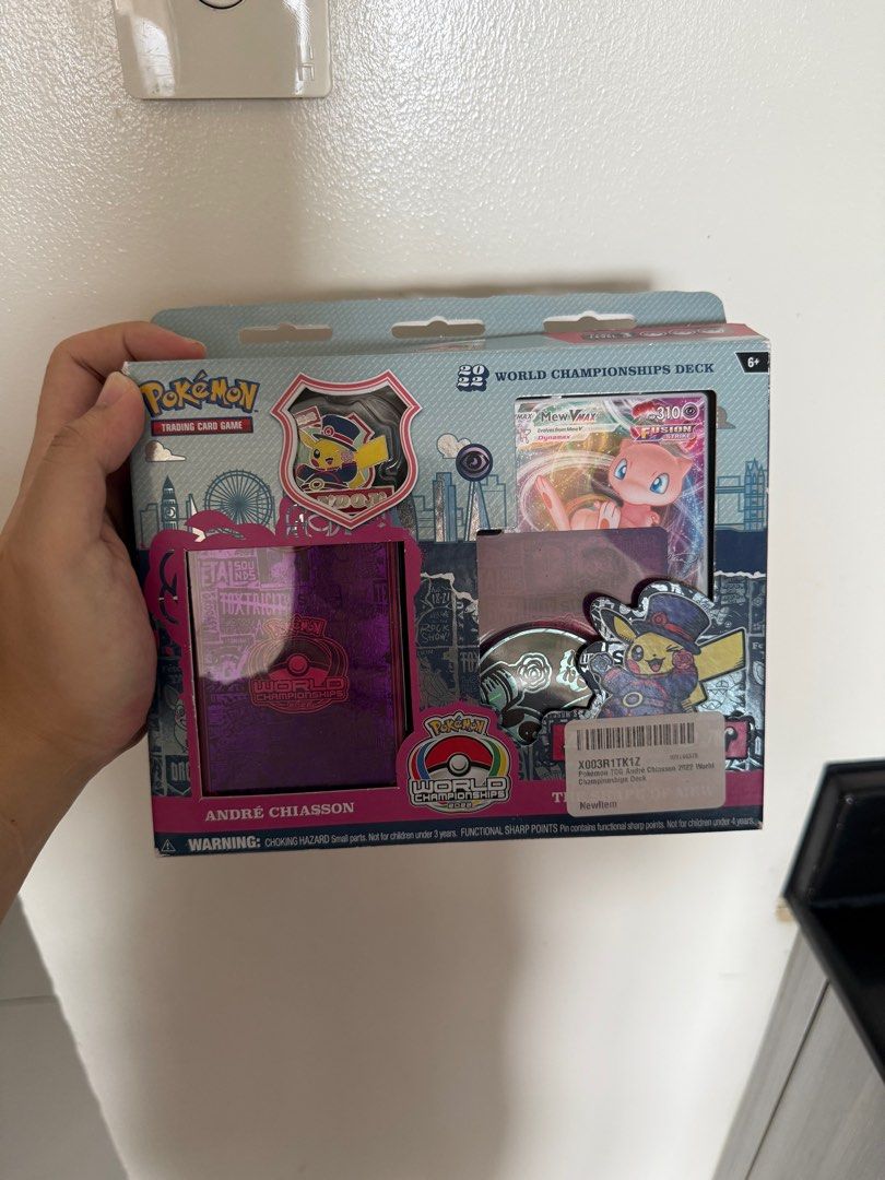 Pokemon World Championships Deck (Category: Card Packs) located in Manila. Submitted by declutterwmexox (Listing ID 1406058617, Image 1). Description: - Andre Chiasson Masters Top 8 deck from the Pokemon World Championships - Includes: Deck, pin, and accessories - Features the Shape of Mew - Fusion Strike deck - Box with Pokemon Trading Card Game logo Note: Only the box was opened to check list of contributors in the booklet (my cousin was one of