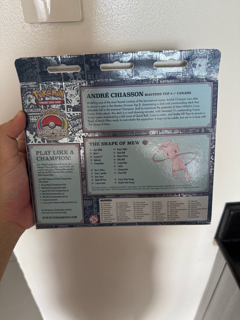 Pokemon World Championships Deck (Category: Card Packs) located in Manila. Submitted by declutterwmexox (Listing ID 1406058617, Image 2). Description: - Andre Chiasson Masters Top 8 deck from the Pokemon World Championships - Includes: Deck, pin, and accessories - Features the Shape of Mew - Fusion Strike deck - Box with Pokemon Trading Card Game logo Note: Only the box was opened to check list of contributors in the booklet (my cousin was one of