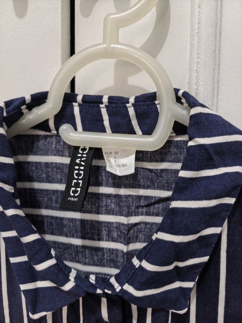 PRE-LOVED BLOUSE /OFFICE TOP/Divided BY H&M (Category: Blouses) located in Mandaluyong City. Submitted by berriesweet (Listing ID 1406051729, Image 1). Description: - Pre-loved H&M Divided blouse - Size: M - Design: Navy and white stripes - Style: Office top / Casual - Condition: 7/10.