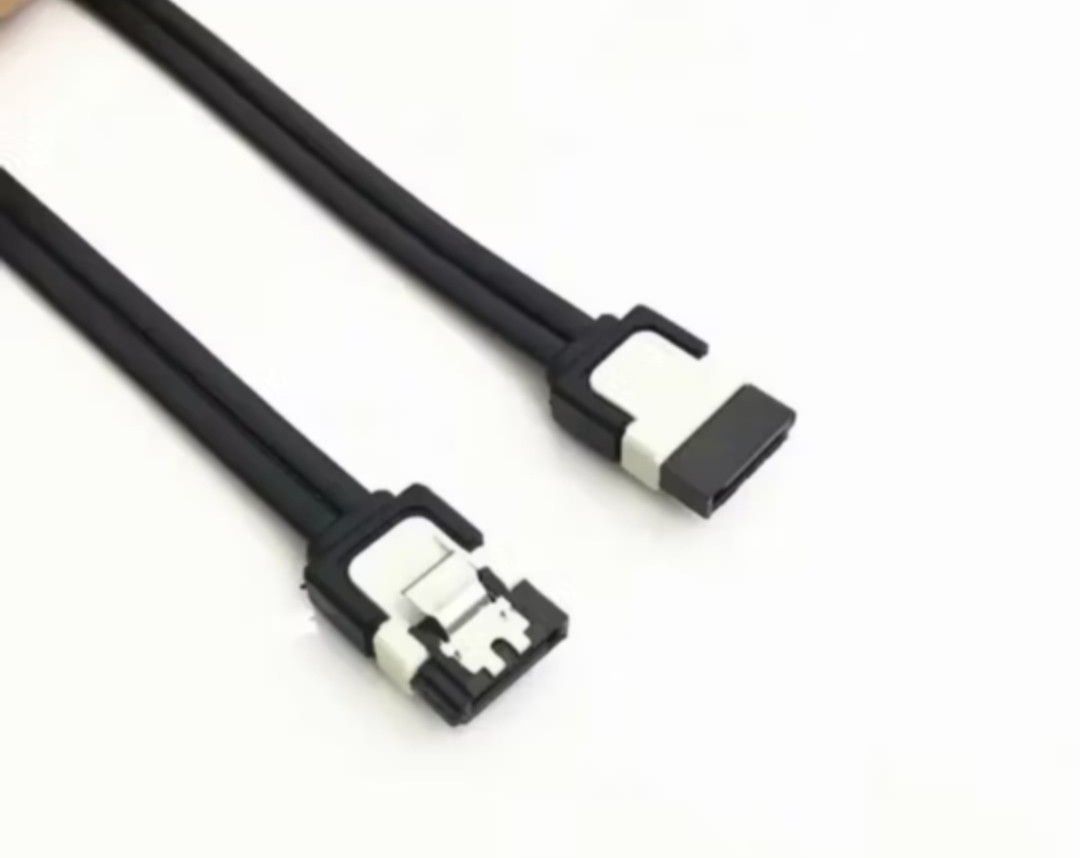 SATA Data Cable (Category: Cables & Adaptors) located in Singapore. Submitted by sl4226 (Listing ID 1405990499, Image 1). Description: - Connects hard drives or SSDs to your motherboard. - Standard SATA connectors. - Ideal for upgrades or replacements. - Simple and easy to use..