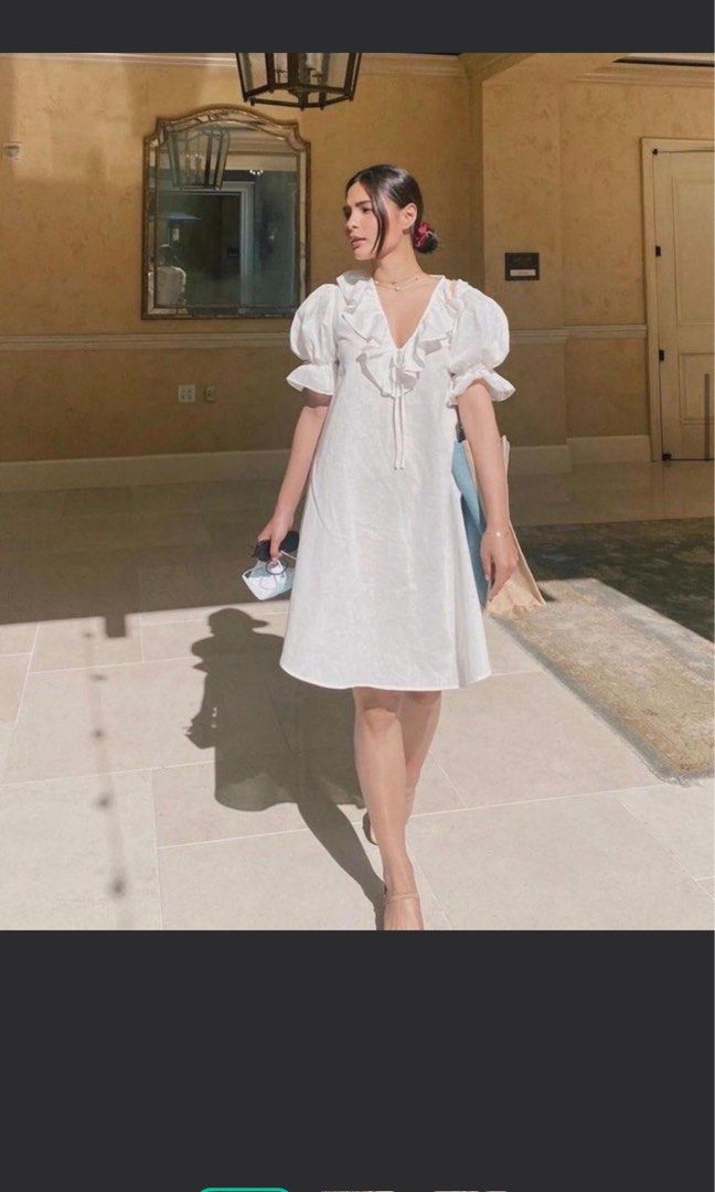 Style Staple dress (Category: Dresses) located in Quezon City. Submitted by d.archive (Listing ID 1405920398, Image 1). Description: ❗️REPRICED FROM 1,900❗️ STYLE STAPLE DRESS Sale at 1,500 only White ruffle sleeve dress. V-neck, loose fit, knee-length. Perfect for casual wear. RFS: DECLUTTERING.