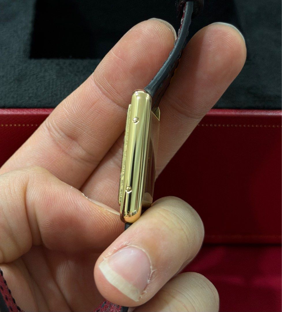 WTS Cartier Tank Louis Large 18k YG - Black Lacquer Dial (WGTA0091) DISCONTINUED (Category: Watches) located in Singapore. Submitted by sneakin2urheart (Listing ID 1405934288, Image 3). Description: Selling the stunning “Black Noir” Cartier Tank Louis in solid 18K yellow gold. This reference is a modern favourite because it combines classic Tank Louis proportion with ultra clean and minimalist black lacquer dial. This houses manual wind in-house 
