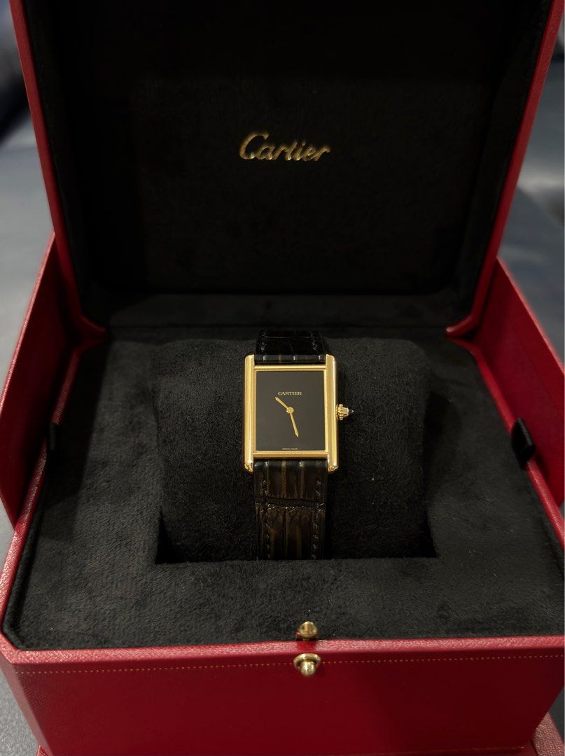 WTS Cartier Tank Louis Large 18k YG - Black Lacquer Dial (WGTA0091) DISCONTINUED (Category: Watches) located in Singapore. Submitted by sneakin2urheart (Listing ID 1405934288, Image 1). Description: Selling the stunning “Black Noir” Cartier Tank Louis in solid 18K yellow gold. This reference is a modern favourite because it combines classic Tank Louis proportion with ultra clean and minimalist black lacquer dial. This houses manual wind in-house 
