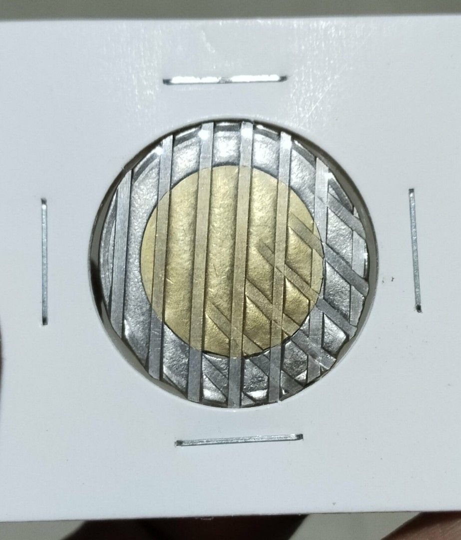 10 piso BSP Error coin (Category: Currency) located in Manila. Submitted by bjie2700446238 (Listing ID 1406282307, Image 1). Description: Blank planchet error coin.