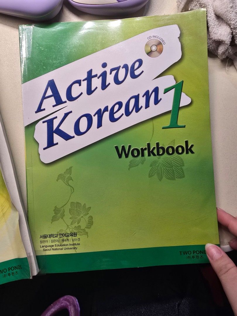 Active Korean 1 Textbook and Workbook (Category: Textbooks) located in San Pedro. Submitted by grennybellz (Listing ID 1406181726, Image 2). Description: - Active Korean 1 textbook and workbook set - Includes textbook, workbook, and CD - Perfect for Korean language learners - From Two Ponds.