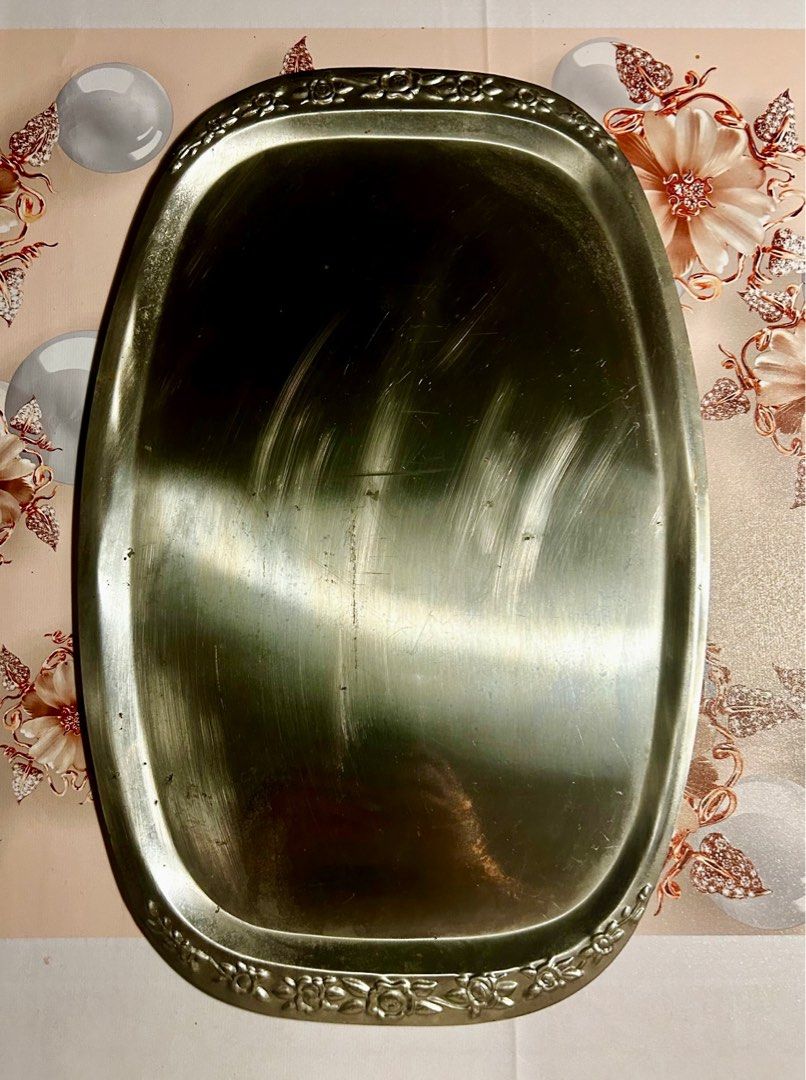 Astra Stainless Steel Serving Tray (Category: Other Kitchenware & Tableware) located in Las Pinas. Submitted by rjmwings (Listing ID 1406119561, Image 1). Description: Astra Stainless Steel Serving Tray Made in Korea Elegant oval serving tray made of stainless steel. Features a decorative floral border. The tray is marked with the "ASTRA STAINLESS STEEL KOREA" stamp. Perfect for serving food or displaying items. A classic piece that adds a touch 