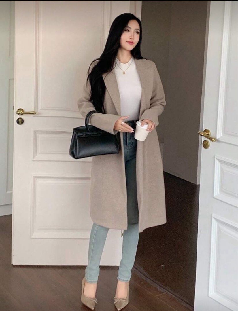 Beige Long Coat good for autumn (Category: Coats, Jackets and Outerwear) located in Quezon City. Submitted by active_assets (Listing ID 1406281517, Image 1). Description: - Elegant beige long coat - Classic lapel collar - Single-button closure - Two front pockets - Tailored fit - Soft, woven fabric - Perfect for layering -Fits Medium frames -never used, only cleaned and washed rfs japan trip got cancelled.