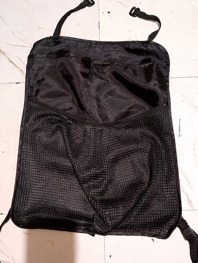 Black Stroller Organizer (Category: Other Babies Going Out Needs) located in Quezon City. Submitted by c_and_a_haus (Listing ID 1406100107, Image 1). Description: - Multiple pockets for storage - Includes a mesh pocket - Several compartments for organization - Adjustable straps for easy installation - Designed to hang on the back of a stroller -can also be used as car seat organizer -unused and washed then stored -no original packaging.