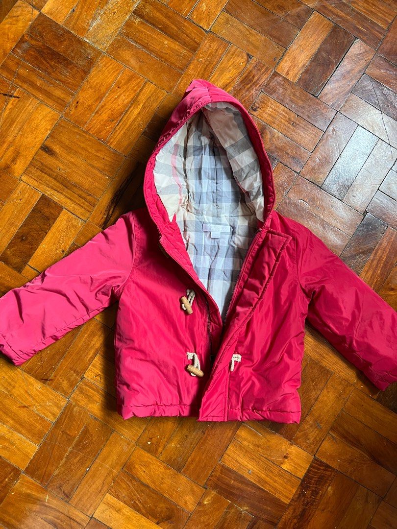 Burberry Children Jacket 18M (Category: Babies & Kids Fashion) located in Paranaque City. Submitted by allabautstuff (Listing ID 1406143114, Image 1). Description: - Burberry Children's jacket - Size: 18M - Color: Pink - Lining: Plaid - Features: Hood and toggle closures - Length: 86cm - Suitable for children.