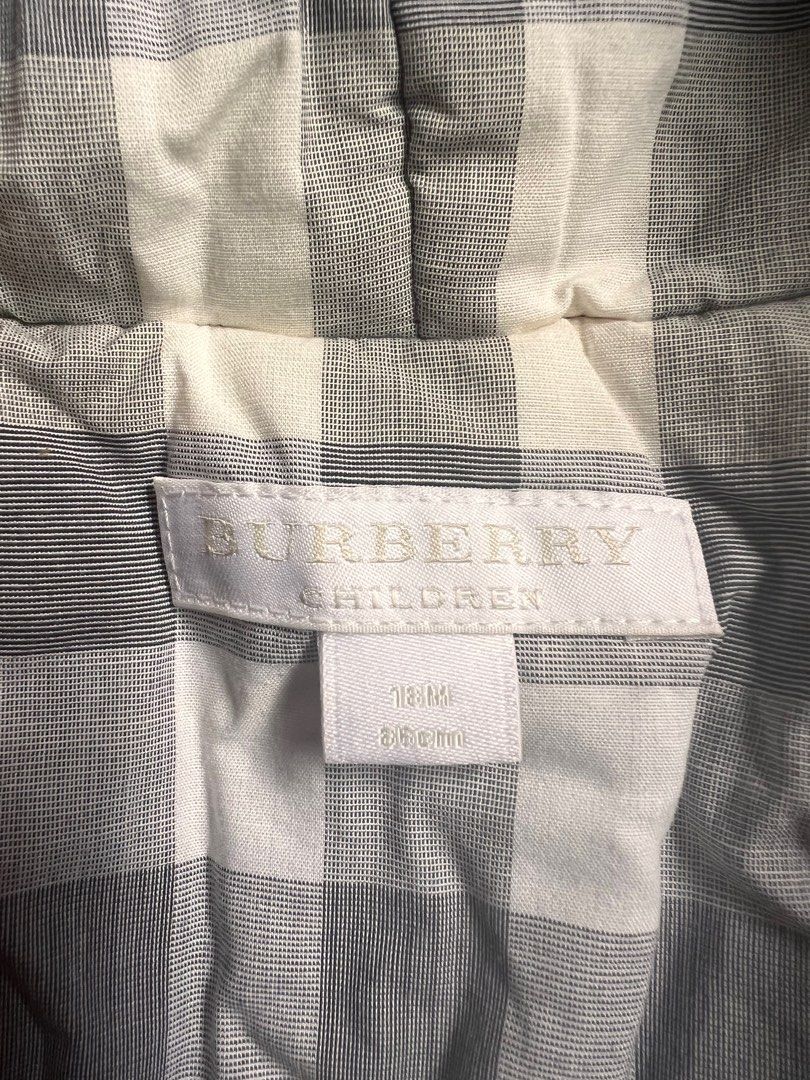 Burberry Children Jacket 18M (Category: Babies & Kids Fashion) located in Paranaque City. Submitted by allabautstuff (Listing ID 1406143114, Image 2). Description: - Burberry Children's jacket - Size: 18M - Color: Pink - Lining: Plaid - Features: Hood and toggle closures - Length: 86cm - Suitable for children.