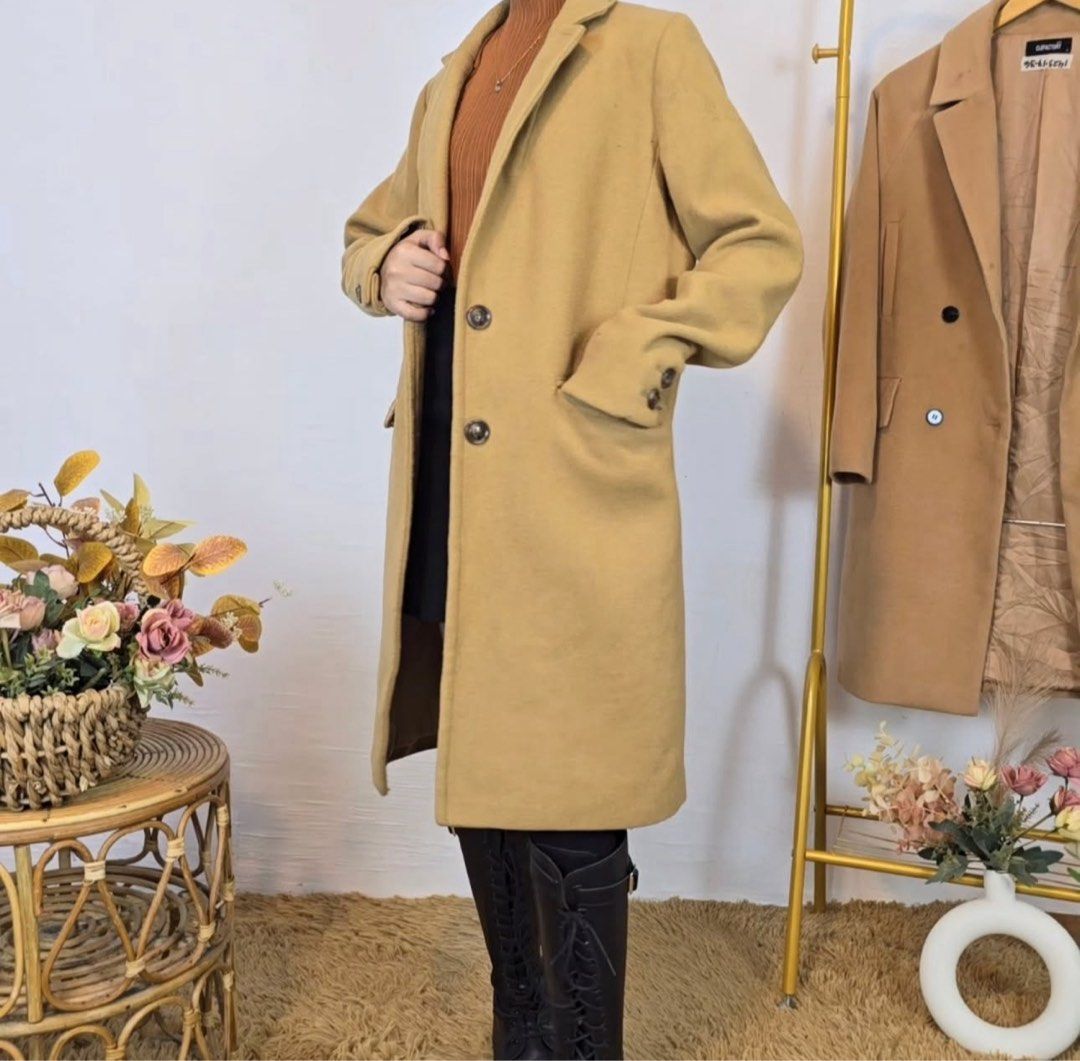Camel Brown Winter or Autumn Wool Coat - Small to Medium (Category: Coats, Jackets and Outerwear) located in Quezon City. Submitted by doooaaashop (Listing ID 1406224764, Image 2). Description: BRAND: Lowrys Farm 🇯🇵 Japan - Classic camel coat - Premium Wool - Shoulder: 14” , Length: 34” - Button closure - Two front pockets - Long sleeves - Warm material - Suitable for cooler weather / winter - Versatile for various outfits.