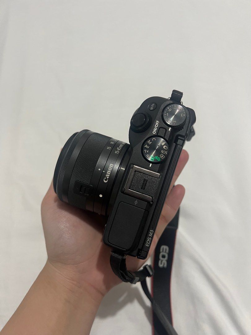 Canon EOS M3 Camera with Lens (Category: Cameras) located in Manila. Submitted by adieeeexx (Listing ID 1406240334, Image 2). Description: For sale: CANON EOS M3 Issues: - No lens cover - Broken LCD screen but no damage sa outputs niya, can send sample shots. RFS: Will buy new camera. Mode of Payment: - GCASH - Meet-up (Robinsons Manila, Circuit Makati, Pedro Gil LRT) Mode of Delivery - Lalamove/ Grab, etc. - Meet-up.