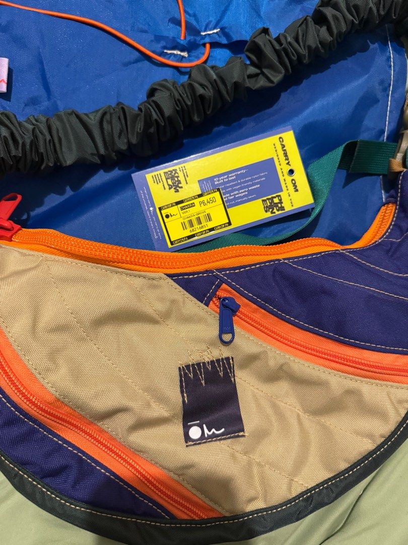 ⚡️SALE⚡️Carry Om Chakra Bag in Grove (Category: Cross-body Bags) located in Taguig. Submitted by kirei.retro (Listing ID 1406237219, Image 2). Description: • Brand new, never used • Current retail price is ₱7,450 • Comes with dust bag, 2 straps, and warranty card • Last price posted RFS: Decluttering.