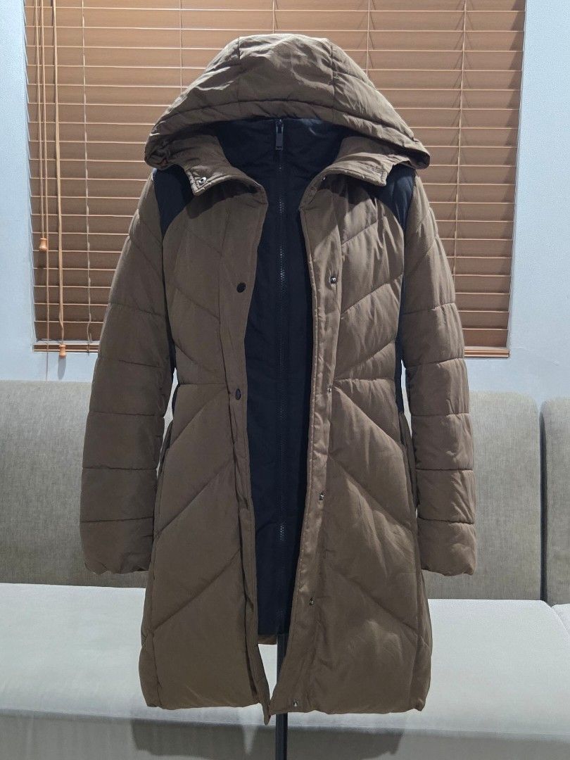Compagna Down Jacket with Hood (Category: Coats, Jackets and Outerwear) located in Pasig City. Submitted by edge26 (Listing ID 1406119605, Image 1). Description: - Compagna jacket - Padded design with hood - Zipper and button closure - Brown exterior with black accents - Size: 66 - Warm and stylish outerwear Dimes: armpit to armpit: 20" length: 33".