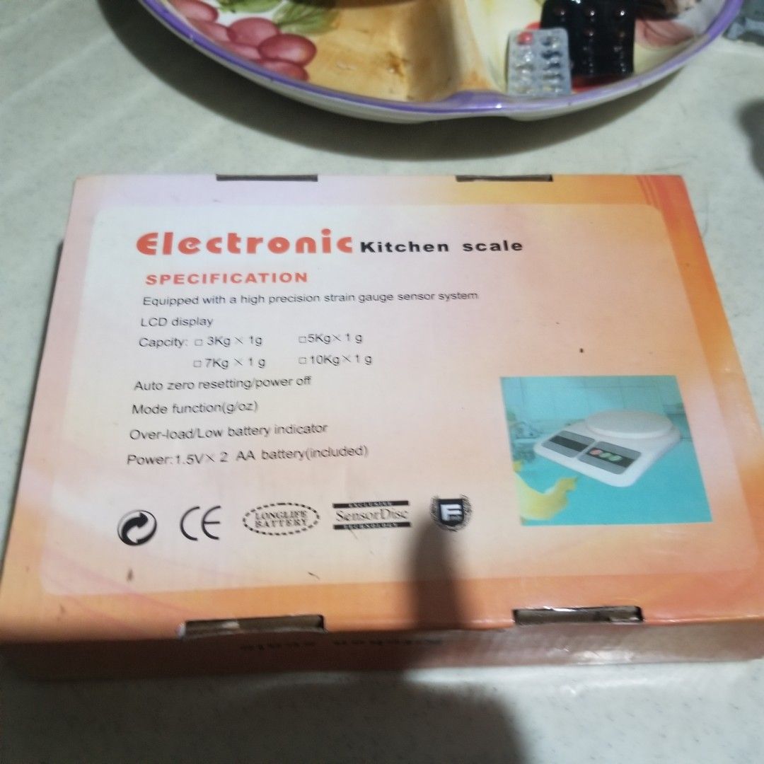 Electronic Kitchen Scale SP-400 (Category: Other Kitchenware & Tableware) located in Paranaque City. Submitted by showboat (Listing ID 1406103775, Image 2). Description: Electronic kitchen scale with LCD display. It has a capacity of 3kg x 1g, 5kg x 1g, 7kg x 1g, and 10kg x 1g. Features auto zero resetting and power off function. It also has a low battery indicator. Includes 2 AA batteries..