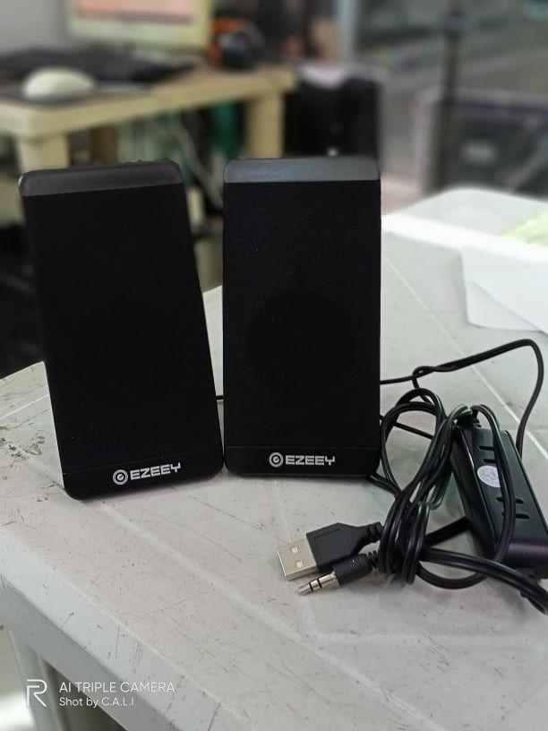 EZEEY S5 Multimedia Speakers (Category: Soundbars, Speakers & Amplifiers) located in Quezon City. Submitted by nearlink091613 (Listing ID 1406186893, Image 3). Description: FOR SALE! S5 Multimedia Speaker Audio & USB Port 1week Warranty Replacement Void Physical Damage - Pair of black EZEEY speakers - Rectangular shape with rounded corners - Features the EZEEY logo - Includes a connection cable - Ideal for computers and other audio devices Visit 