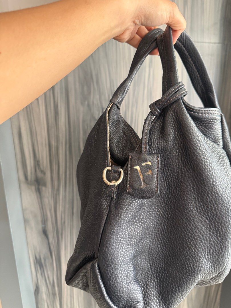 Furla Leather hobo (Category: Luxury Bags & Wallets) located in Quezon City. Submitted by vianca13 (Listing ID 1406123992, Image 2). Description: - Authentic Furla handbag - Pebbled leather exterior - Spacious interior with zipper pocket - Magnetic closure - Fabric lining with Furla logo .