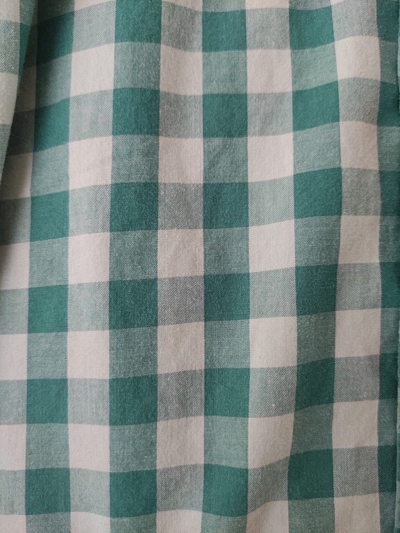 Gap button down (Category: Tshirts & Polo Shirts) located in Singapore. Submitted by timothy2006 (Listing ID 1406187702, Image 2). Description: This short-sleeved shirt features a classic green gingham pattern. It has a button-down front and a collar. The shirt appears to be in good condition.Perfect for casual wear..