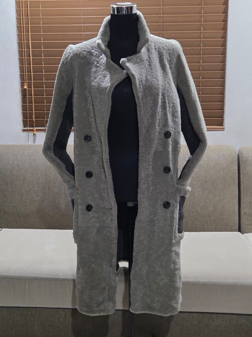 Gray Coat - Size M (Category: Coats, Jackets and Outerwear) located in Pasig City. Submitted by edge26 (Listing ID 1406118868, Image 1). Description: - Stylish gray double-breasted coat - Classic silhouette with notched collar - Medium size, ideal for layering - Soft, warm material - Perfect for cooler weather Size: M / 38a Dimes: Armpit to armpit: 19.5 Length: 39".