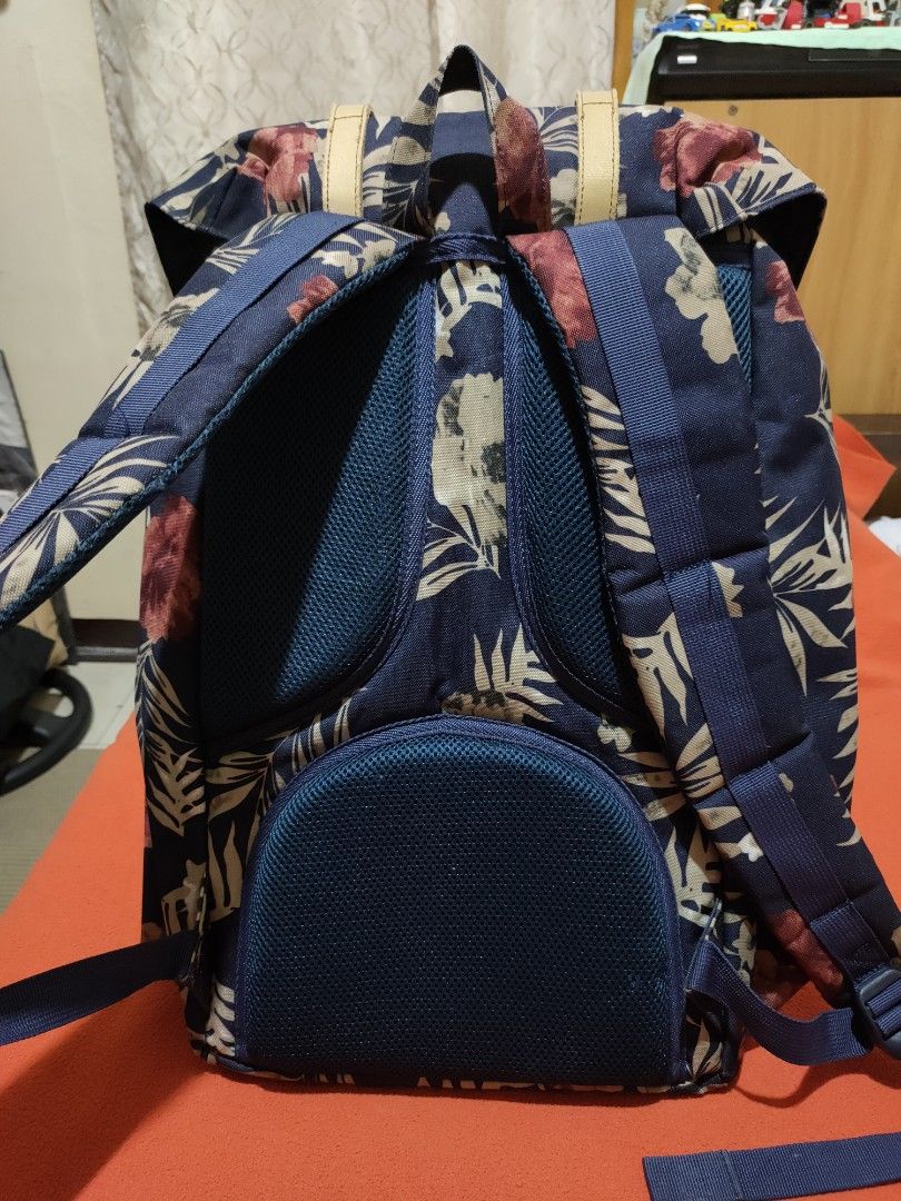 Herschel Floral Backpack (Category: Backpacks) located in Quezon City. Submitted by jhaneth21 (Listing ID 1406147177, Image 2). Description: - Herschel floral backpack - Adjustable straps - Drawstring closure - Front pocket - Padded back support - Red and white striped lining - Herschel label.
