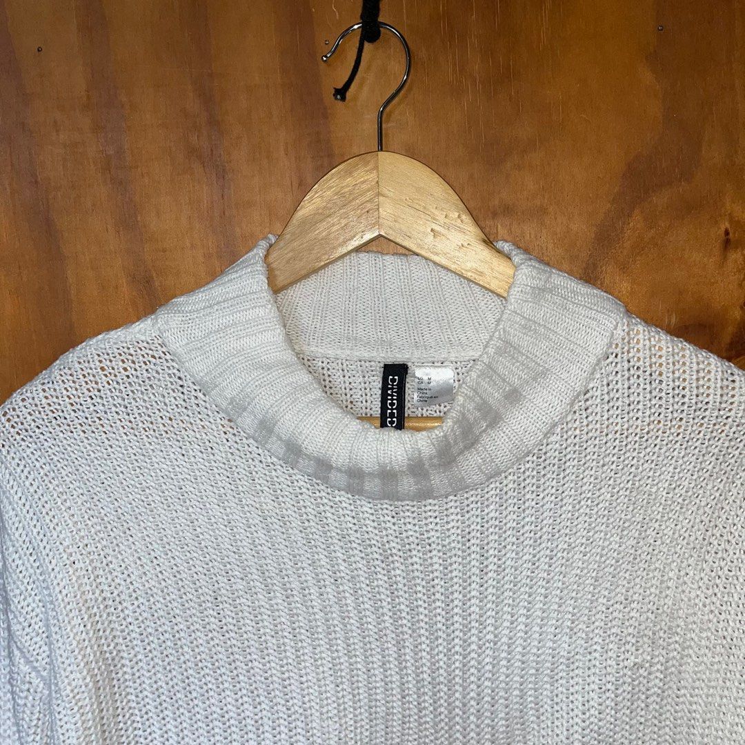H&M White Mock Neck Sweater (Category: Coats, Jackets and Outerwear) located in Baguio. Submitted by basicthriftbaguio (Listing ID 1406230582, Image 2). Description: h&m divided knitted sweater 🤍 perf for ber months!! no flaws, needs wash only sa neck area medium on tag ₱280.