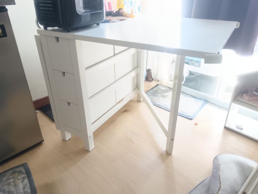 IKEA Norden Gateleg (White) Space Saver Table (Category: Tables & Sets) located in Manila. Submitted by carou48348 (Listing ID 1406151235, Image 2). Description: For Sale: IKEA Norden Gateleg Type: Multifunctional and Space Saver Table Original Price: Php 14,999.00 SELLING PRICE: Php 9,000.00 (negotiable) Status: Good as new with few dents and scratches RFS: Need Cash Nearby Landmarks: La Salle and Cash and Carry Note: For pick up (Friday and Sat