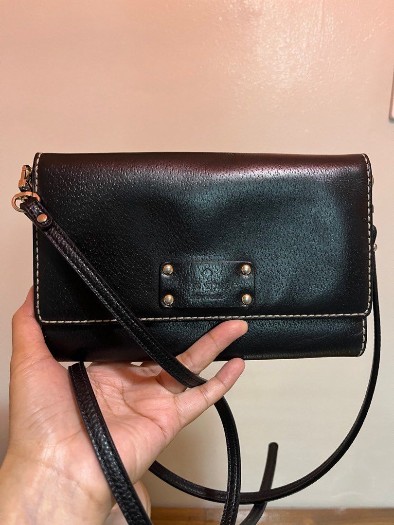 Kate Spade Black Leather Crossbody Bag (Category: Luxury Bags & Wallets) located in Angeles City. Submitted by phynes (Listing ID 1406173340, Image 1). Description: Authentic kate spade / US bought minor stain sa loob no rub over all good lining replaced strap still genuine leather Excellent condition .