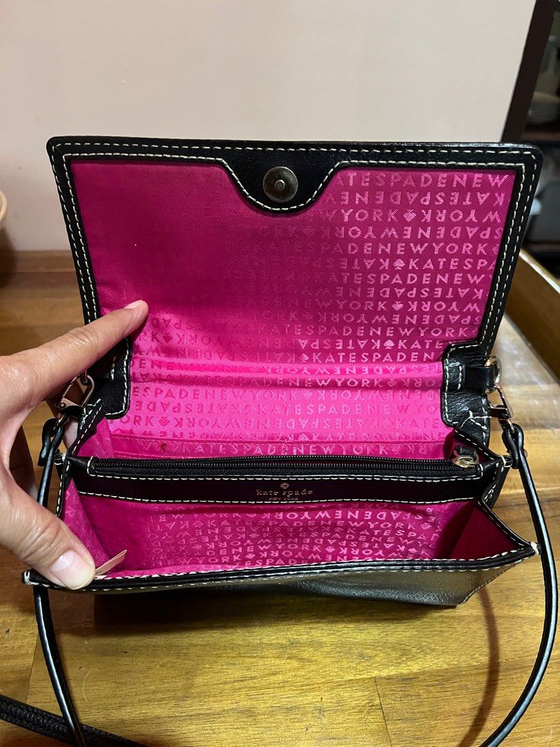 Kate Spade Black Leather Crossbody Bag (Category: Luxury Bags & Wallets) located in Angeles City. Submitted by phynes (Listing ID 1406173340, Image 2). Description: Authentic kate spade / US bought minor stain sa loob no rub over all good lining replaced strap still genuine leather Excellent condition .