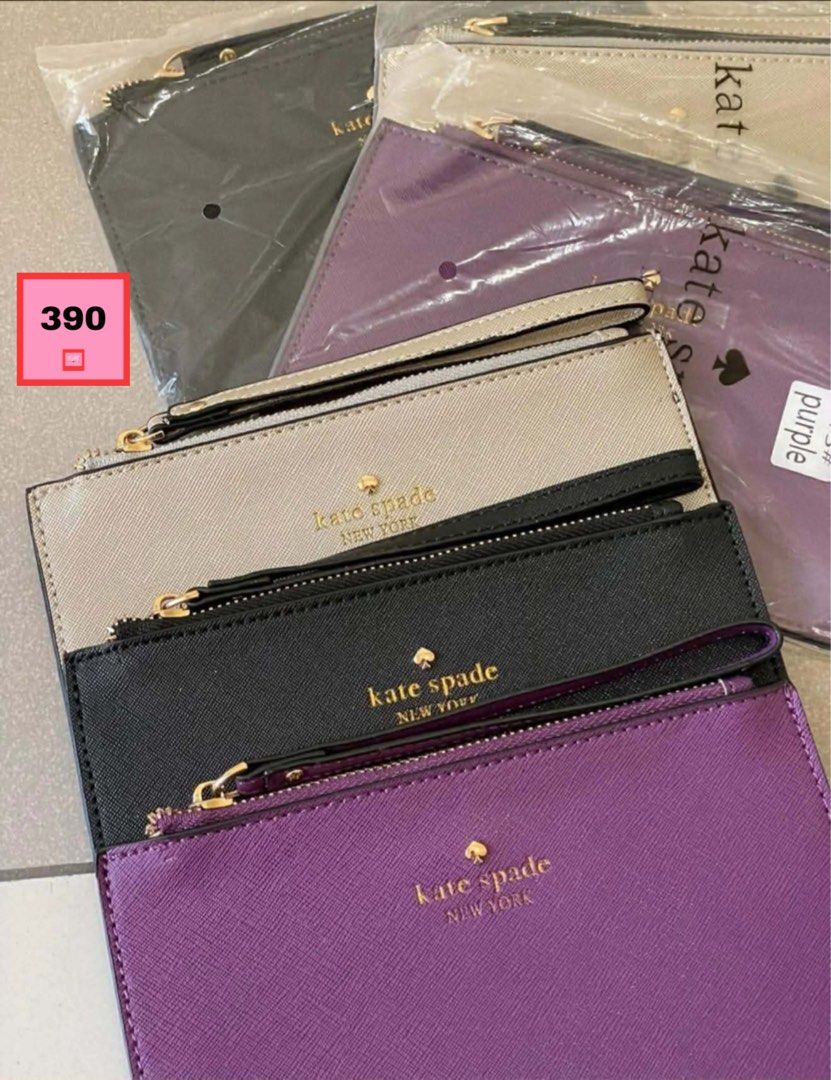 Kate Spade New York Wristlet (Category: Luxury Bags & Wallets) located in Santa Rosa. Submitted by fmonlinestore.ph (Listing ID 1406246693, Image 2). Description: Kate Spade New York wristlets. Available in black, purple, gray, and beige. Features zip closure and wrist strap. Price: ₱390. SALE (assorted no choosing of design and color) .