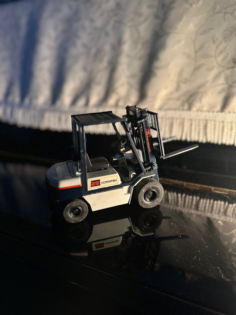 Komatsu FD25-11 forklift (Category: Vintage Collectibles) located in Singapore. Submitted by melattempts (Listing ID 1406253441, Image 2). Description: Vintage Collectible Toy ✨Letting go of this beauty (over 30 years) that’s been with us for a long time. It comes with the original box and shows natural wear & tear due to age, perfect for collectors who appreciate classics! 💛 Just hoping it finds a new home with someone who’ll treasure it more t